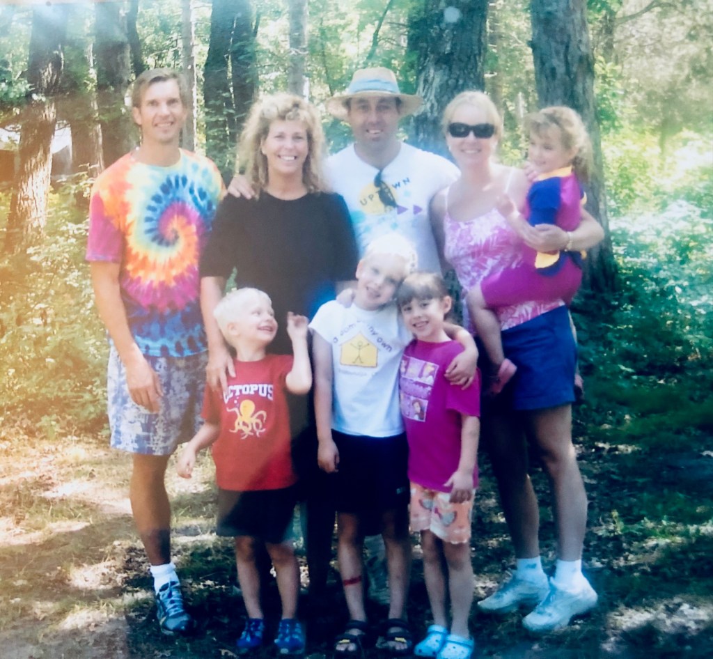 Two families with young children sharing a camping adventure